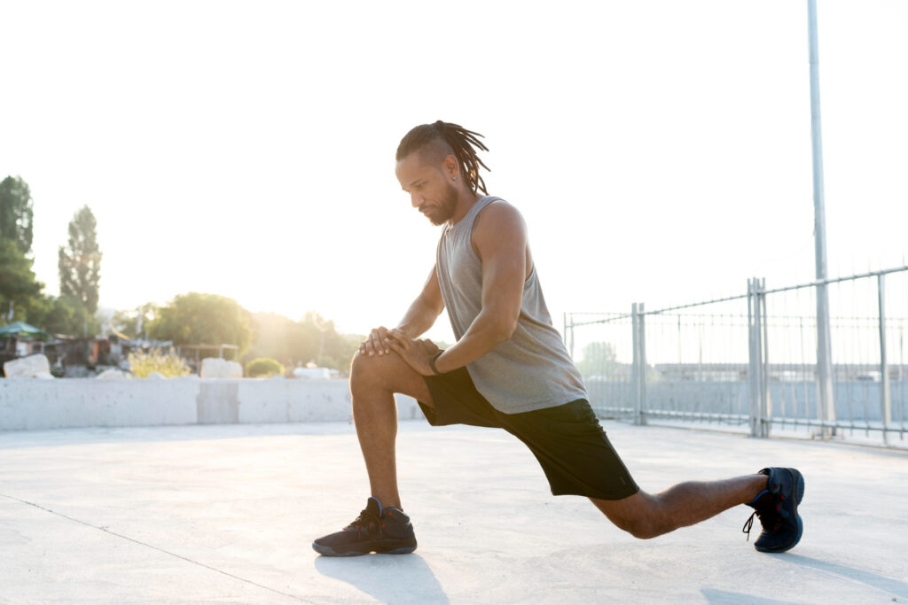 man stretching in the court